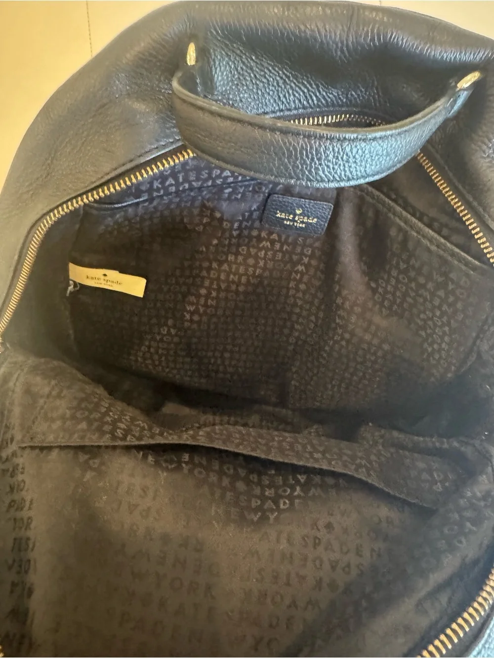 kate spade black leather backpack with gold hardware